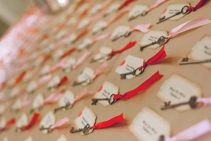 Escort Cards attached to keys for a wedding at the Ritz Carlton in San Francisco, CA. Captured by NYC wedding photographer Ben Lau.