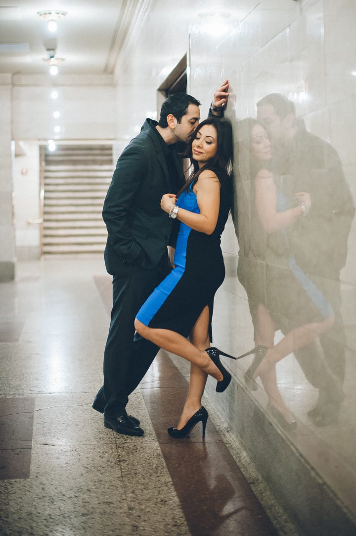 NYC engagement session in Grand Central Station. Captured by NYC wedding photographer Ben Lau.