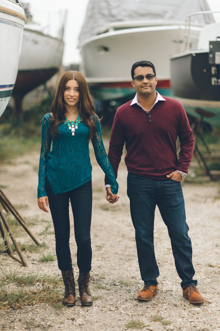 Tivoli and David pose during their engagement session in Greenport, NY. Captured by NYC wedding photographer Ben Lau.