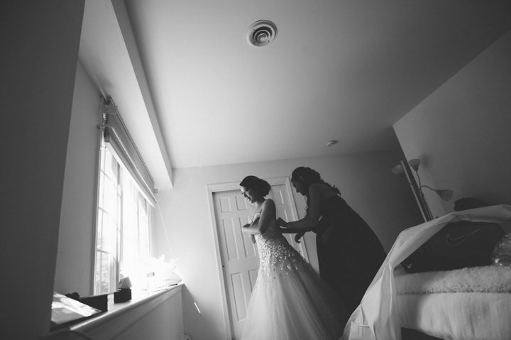 Bride preps for her wedding at The Palace at Somerset Park, NJ. Captured by awesome NJ wedding photographer Ben Lau.