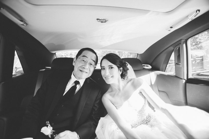 Bride and her father on their way to a wedding at The Palace at Somerset Park, NJ. Captured by awesome NJ wedding photographer Ben Lau.