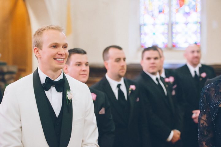 Groom smiles during his St. Peter the Apostle Church wedding in New Brunswick, NJ. Captured by NJ wedding photographer Ben Lau.