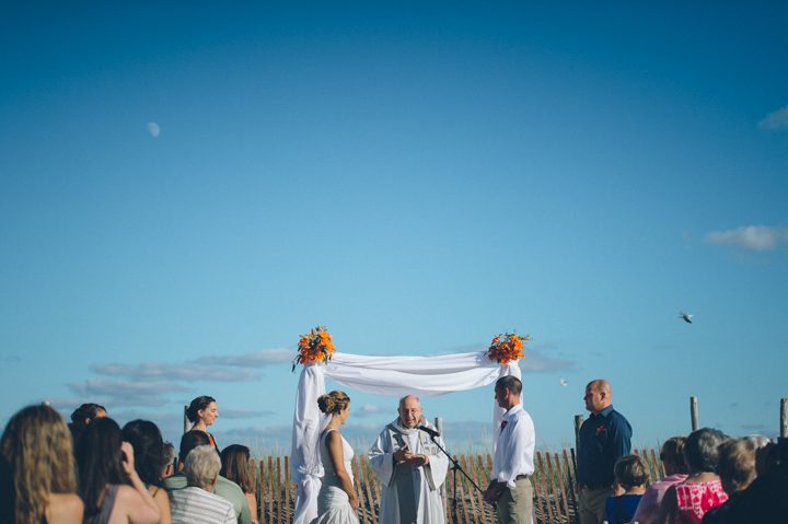 Wedding ceremony photos at the Sea Shell Resort in Long Beach Island, NJ. Captured by NJ wedding photographer Ben Lau.