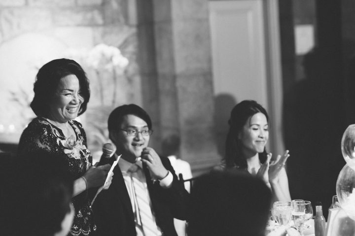 Toasts during a Tappan Hill Mansion wedding reception. Captured by NYC wedding photographer Ben Lau.