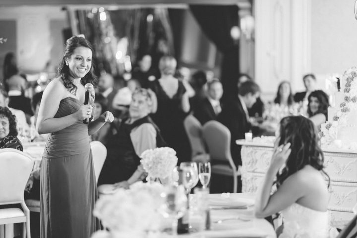 Maid of honor toasts during a Westmount Country Club Wedding in Woodland Park, NJ. Captured by awesome NJ wedding photographer Ben Lau.