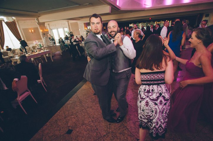 Guests dance during a Westmount Country Club Wedding in Woodland Park, NJ. Captured by awesome NJ wedding photographer Ben Lau.