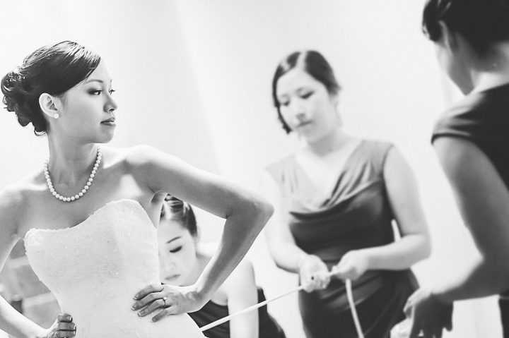 Bride gets ready at the Le Merdian in Crystal City, VA. Captured by NYC wedding photographer Ben Lau.