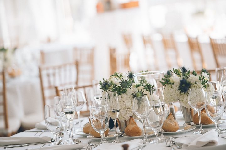 Reception decor for a beach wedding at Oceanbleu in Westhampton, NY. Captured by NYC wedding photographer Ben Lau.