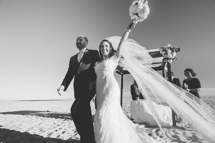 Beach wedding ceremony at Westhampton Bath & Tennis in Westhampton, NY. Captured by NYC wedding photographer Ben Lau.