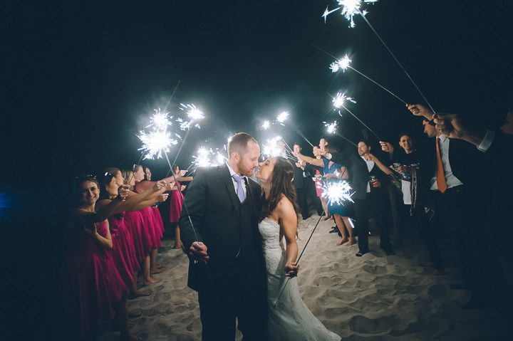 Sparkler send-off at Oceanblue/Westhampton Bath & Tennis in Westhampton, NY. Captured by NYC wedding photographer Ben Lau.