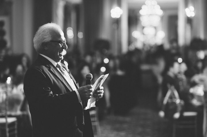 Toasts during a wedding reception at the Belvedere Hotel. Captured by NYC wedding photographer Ben Lau.