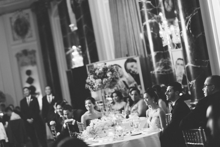 Toasts during a wedding reception at the Belvedere Hotel. Captured by NYC wedding photographer Ben Lau.