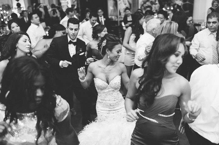 Guests dancing during a wedding reception at the Belvedere Hotel. Captured by NYC wedding photographer Ben Lau.