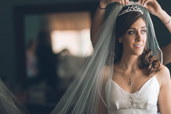 Bride prepares for her wedding at Glen Cove Mansion. Captured by NYC wedding photographer Ben Lau.