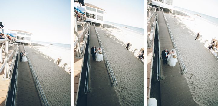 Bride and her father walk down the aisle during her wedding at McLoone's Pier House in Long Branch, NJ. Captured by NYC wedding photographer Ben Lau.
