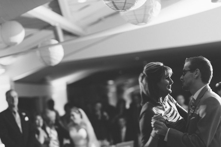 Groom and his mother dance during a McLoones Pierhouse Wedding in Long Branch, NJ. Captured by NYC wedding photographer Ben Lau.