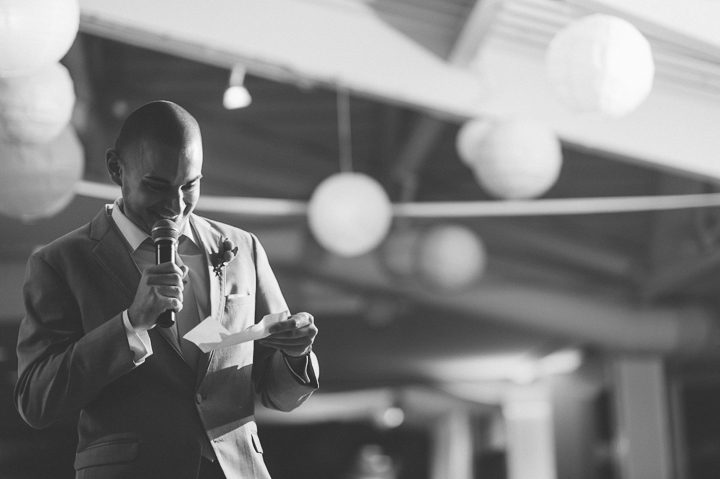 Best man speech during a McLoones Pierhouse Wedding in Long Branch, NJ. Captured by NYC wedding photographer Ben Lau.