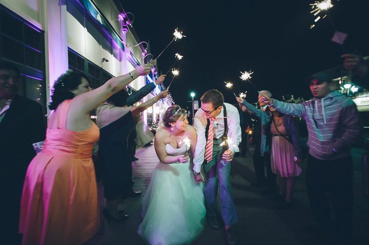 Sparkler send off after a McLoones Pierhouse Wedding in Long Branch, NJ. Captured by NYC wedding photographer Ben Lau.
