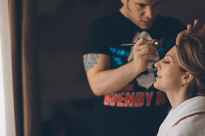 Bride gets her make up done for their New York City Hall wedding, captured by NYC wedding photographer Ben Lau.