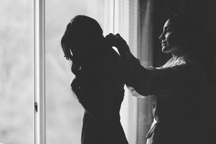 Bride getting ready for her wedding at the Crest Hollow Country Club wedding captured by NYC wedding photographer Ben Lau.