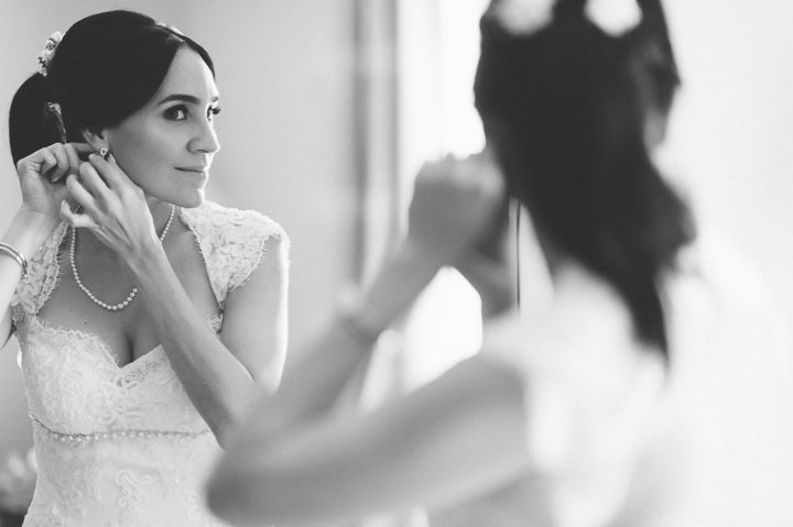 Bride getting ready for her wedding at the Crest Hollow Country Club wedding captured by NYC wedding photographer Ben Lau.