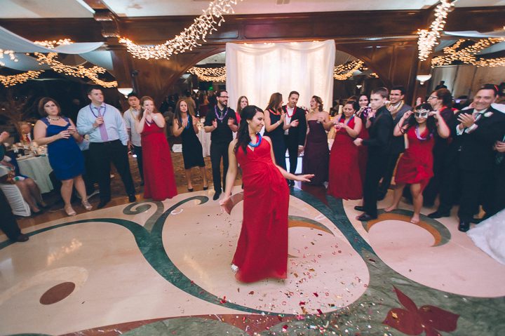 Guests dance at wedding reception at Crest Hollow Country Club. Captured by NYC wedding photographer Ben Lau.