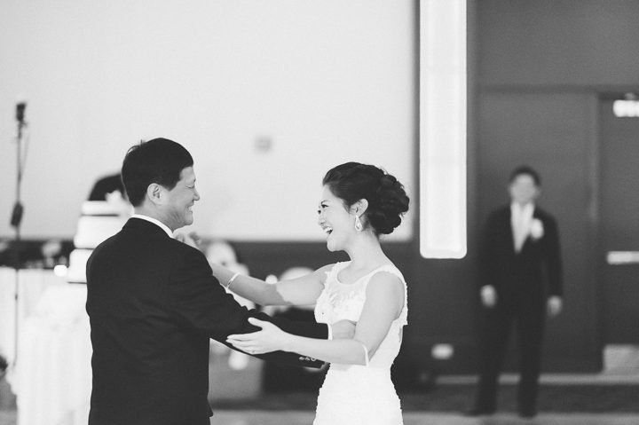 Bride and her father dance during their wedding reception at Dae Dong Manor in Flushing, NY. Captured by NYC wedding photographer Ben Lau.