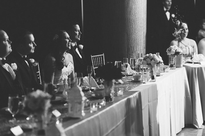 Toasts during a wedding reception at the Inn at the Colonnade. Captured by Baltimore wedding photographer Ben Lau.
