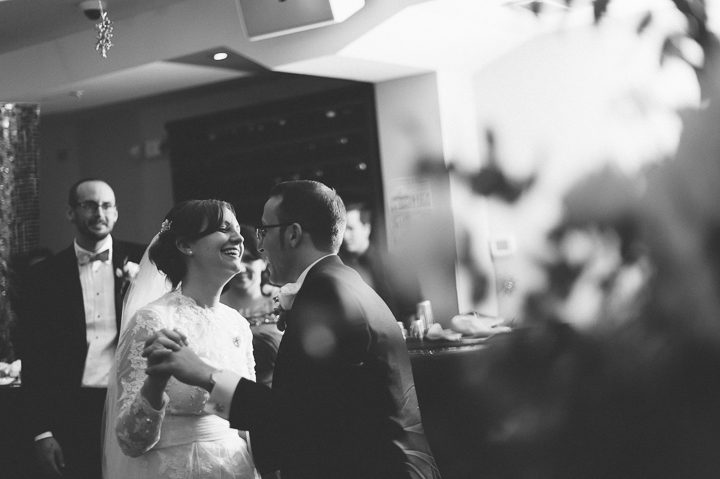 First dances during a wedding reception at Tula's Lounge in New Brunswick, NJ. Captured by Central Jersey Wedding Photographer Ben Lau.