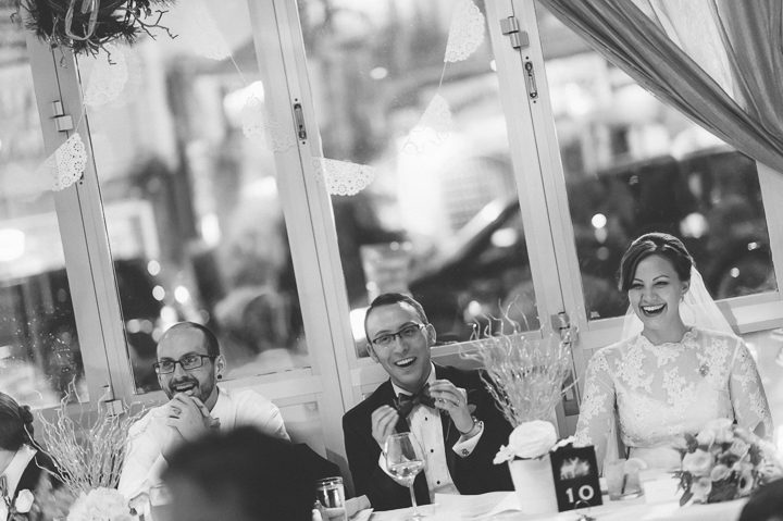 Toasts during a wedding reception at Tula's Lounge in New Brunswick, NJ. Captured by Central Jersey Wedding Photographer Ben Lau.