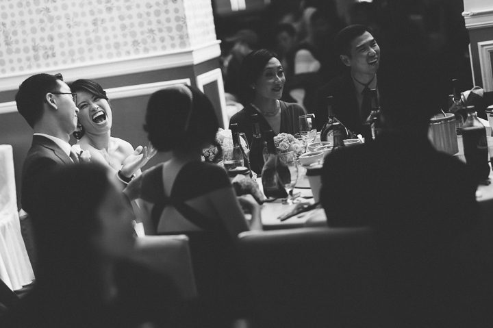 Toasts during a wedding reception at Mudan's in Flushing Queens. Captured by NYC wedding photographer Ben Lau.