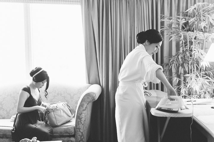 Bridesmaids get ready for Sandy's wedding day at Mudan's. Captured by NYC wedding photographer Ben Lau.