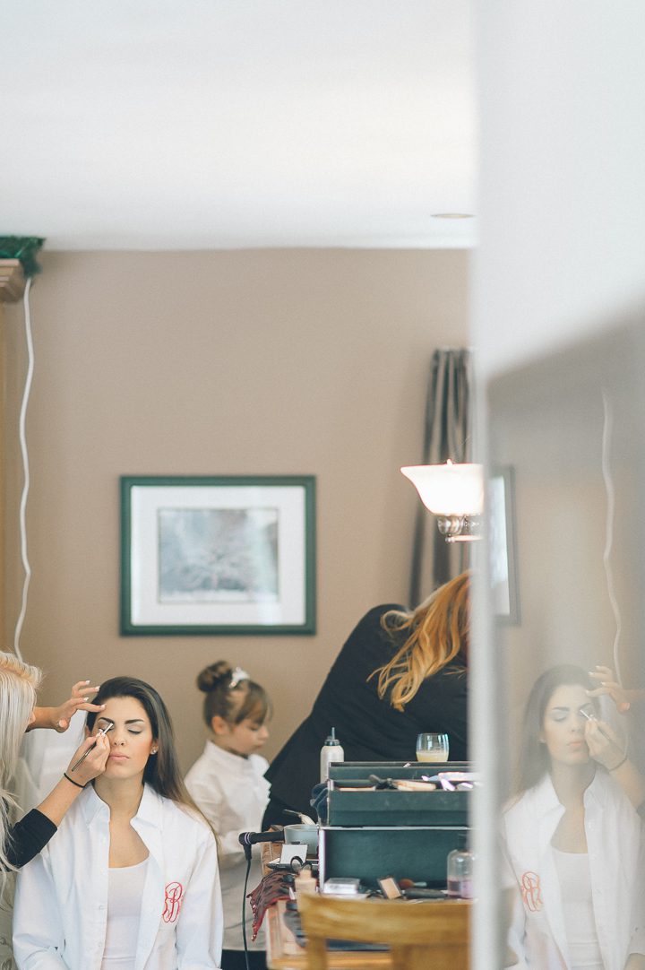 Bride preps for her wedding at the Westmount Country Club in Woodland Park, NJ. Captured by Northern NJ wedding photographer Ben Lau.