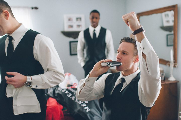 Groomsmen pregaming on the morning of a wedding at the Westmount Country Club. Captured by Northern NJ wedding photographer Ben Lau.