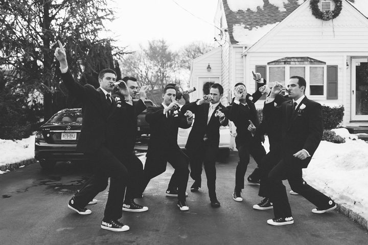 Groomsmen goof around before a wedding at the Westmount Country Club. Captured by Northern NJ wedding photographer Ben Lau.