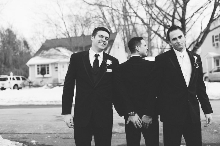 Groomsmen goof around before a wedding at the Westmount Country Club. Captured by Northern NJ wedding photographer Ben Lau.