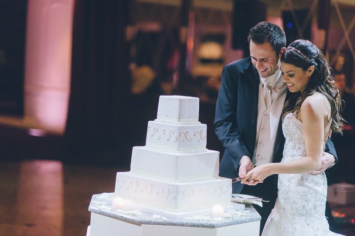 Cake cutting during a wedding reception at the Westmount Country Club. Captured by Northern NJ wedding photographer Ben Lau.