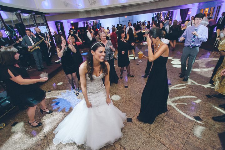 Bride dances during a wedding reception at the Westmount Country Club. Captured by Northern NJ wedding photographer Ben Lau.