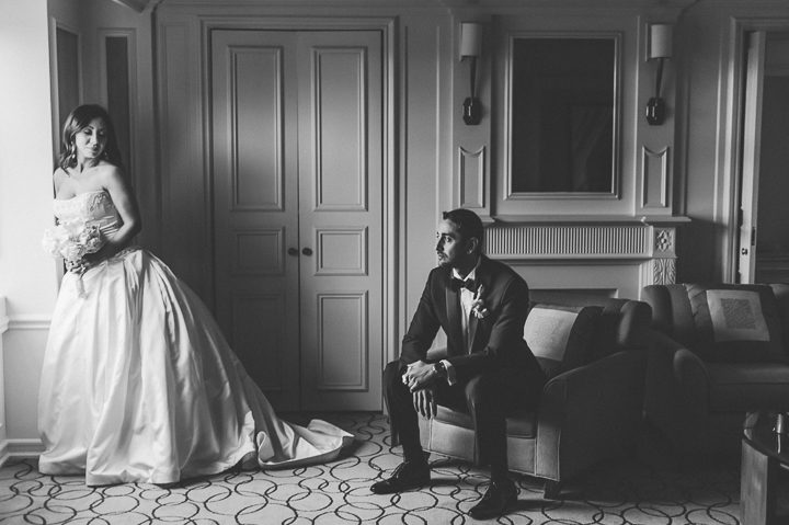 Bride and groom portrait inside the Essex House. Captured by NYC wedding photographer Ben Lau.