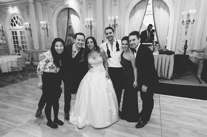 Ben and Karis Lau with their brides and grooms at the Essex House in NYC. Captured by NYC wedding photographer Ben Lau.