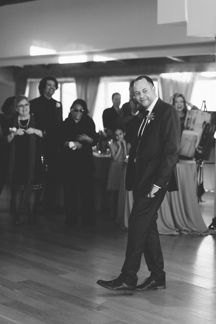 Bride sings for the groom during a wedding at the Maritime Parc in Jersey City, NJ. Captured by NYC wedding photographer Ben Lau.