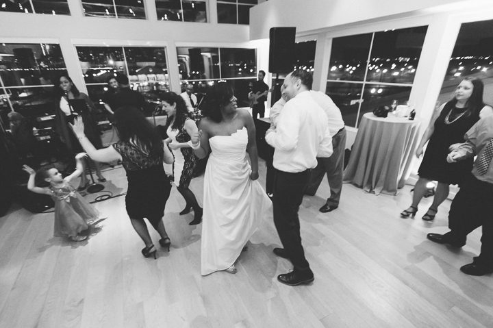 Bride and groom dance during a wedding reception at the Maritime Parc in Jersey City, NJ. Captured by NYC wedding photographer Ben Lau.