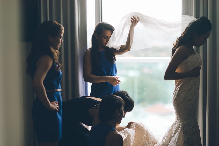 Bride getting ready on the morning of a wedding day at the Sonesta Bayfront Hotel in Coconut Grove, Miami. Captured by Miami wedding photographer Ben Lau.