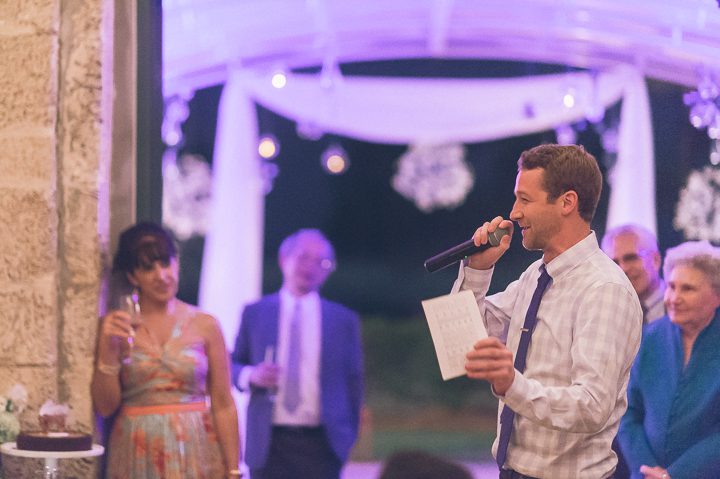Toasts during a wedding reception at the Red Fish Grill in Miami, FL. Captured by Miami wedding photographer Ben Lau.