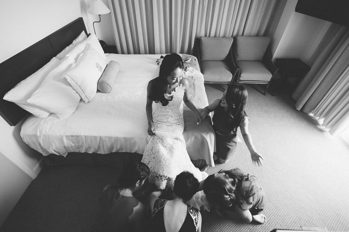 Bride gets ready in her suite on the morning of her wedding day at the Sonesta Bayfront Hotel in Coconut Grove, Miami. Captured by Miami wedding photographer Ben Lau.