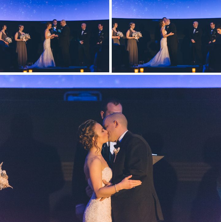 Wedding ceremony at the planetarium inside the Franklin Institute in Philadelphia. Captured by NYC wedding photographer Ben Lau.