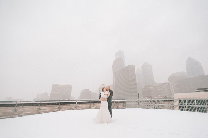 Bride and groom portraits on the rooftop of the Franklin Institute in Philadelphia. Captured by NYC wedding photographer Ben Lau.