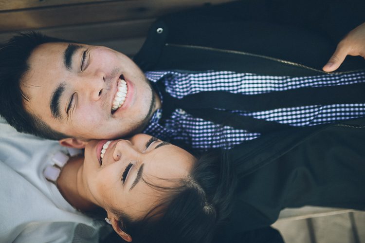 Yilan & Han's engagement session in Coney Island. Captured by Brooklyn Wedding Photographer Ben Lau.
