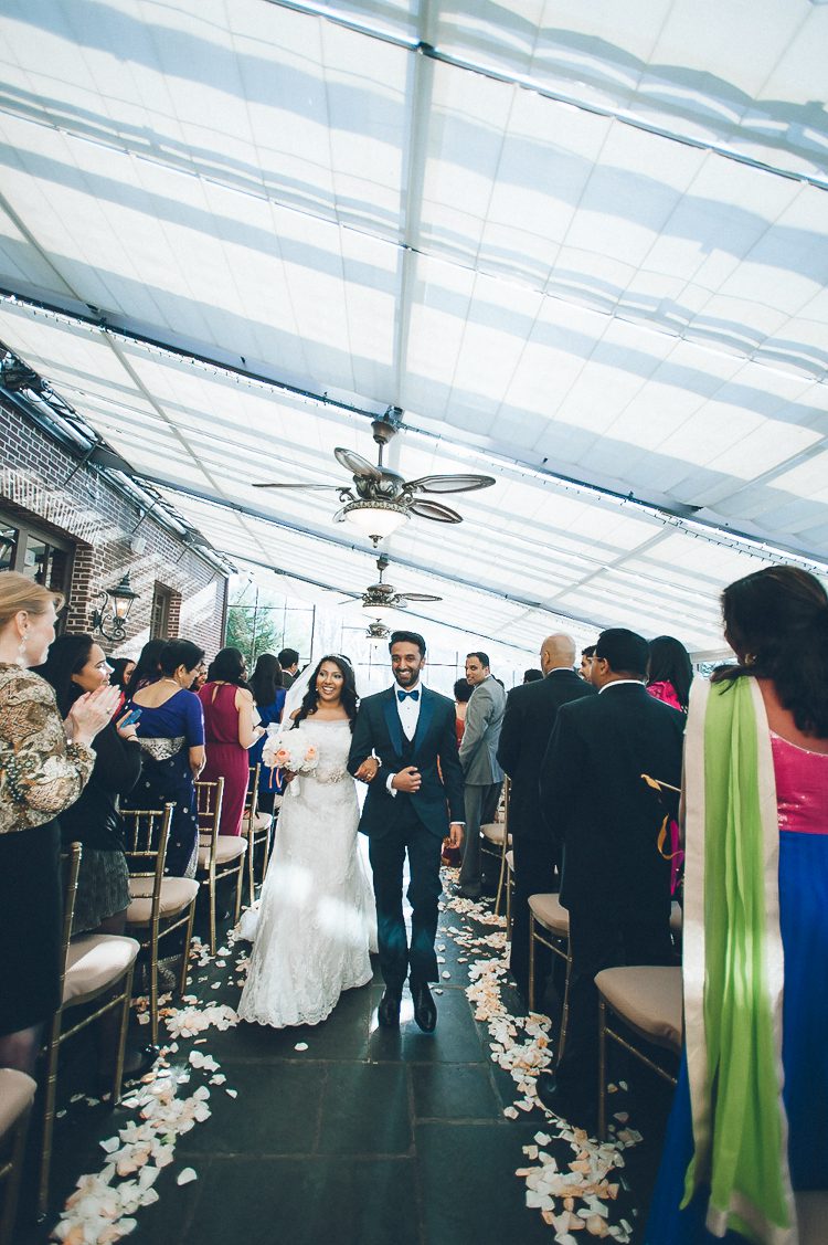 Wedding cermeony at NYIT de Seversky Mansion in Old Westbury, NY. Captured by Long Island Wedding Photographer Ben Lau.
