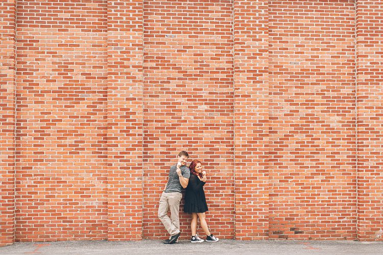Alina & Yuriy share an ice cream during their engagement session in Baltimore with NJ wedding photographer Ben Lau.